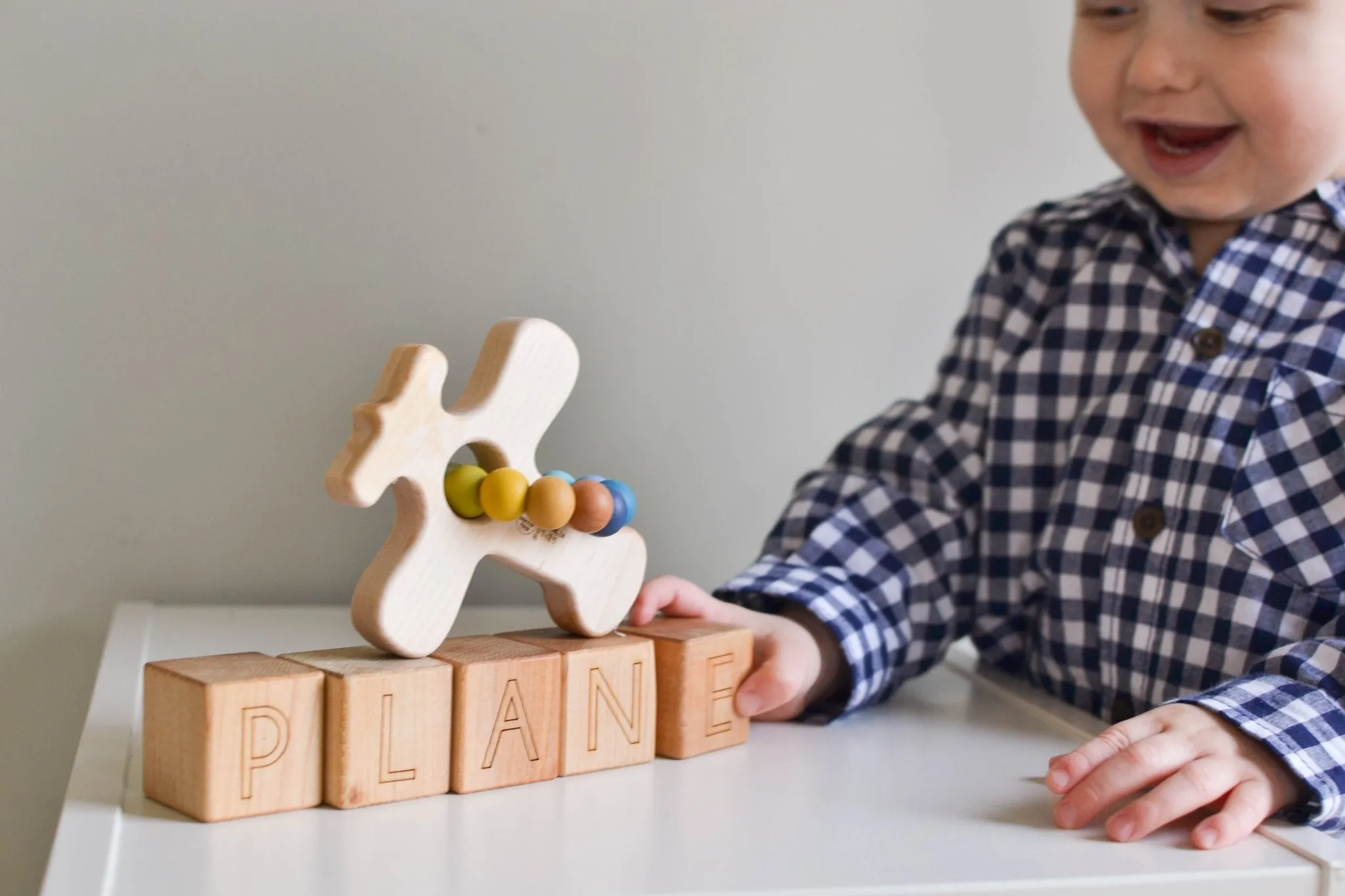 Airplane Wood Grasping Toy With Teething Beads